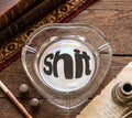 THE "SHIT" HEART SHAPED GLASS ASHTRAY