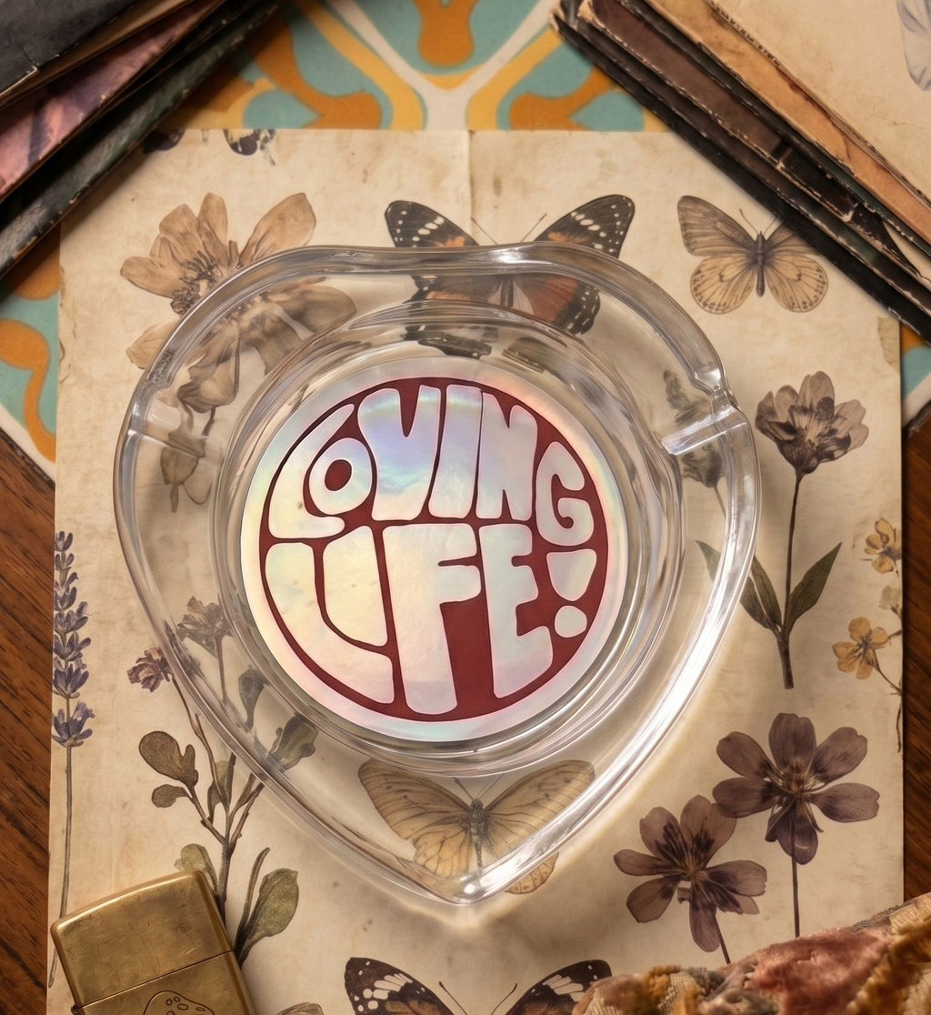 THE "LOVING LIFE!" HEART-SHAPED GLASS ASHTRAY