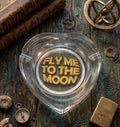 THE "FLY ME TO THE MOON" HEART-SHAPED GLASS ASHTRAY