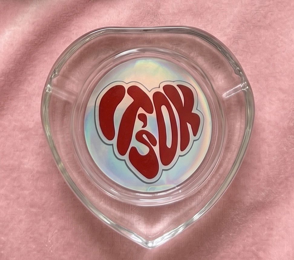 THE "IT'S OK" HEART-SHAPED GLASS ASHTRAY