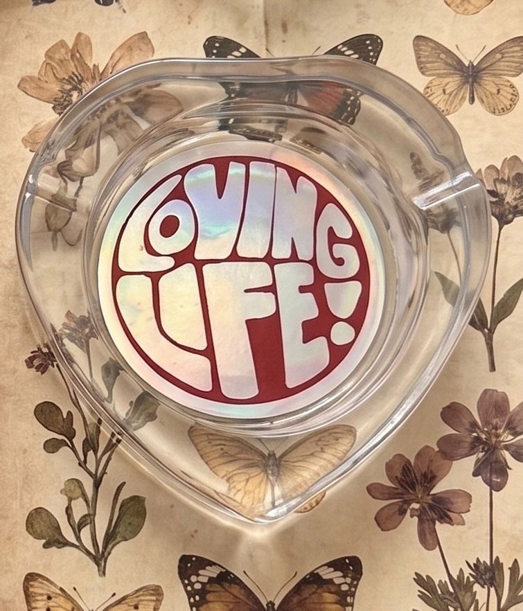 THE "LOVING LIFE!" HEART-SHAPED GLASS ASHTRAY