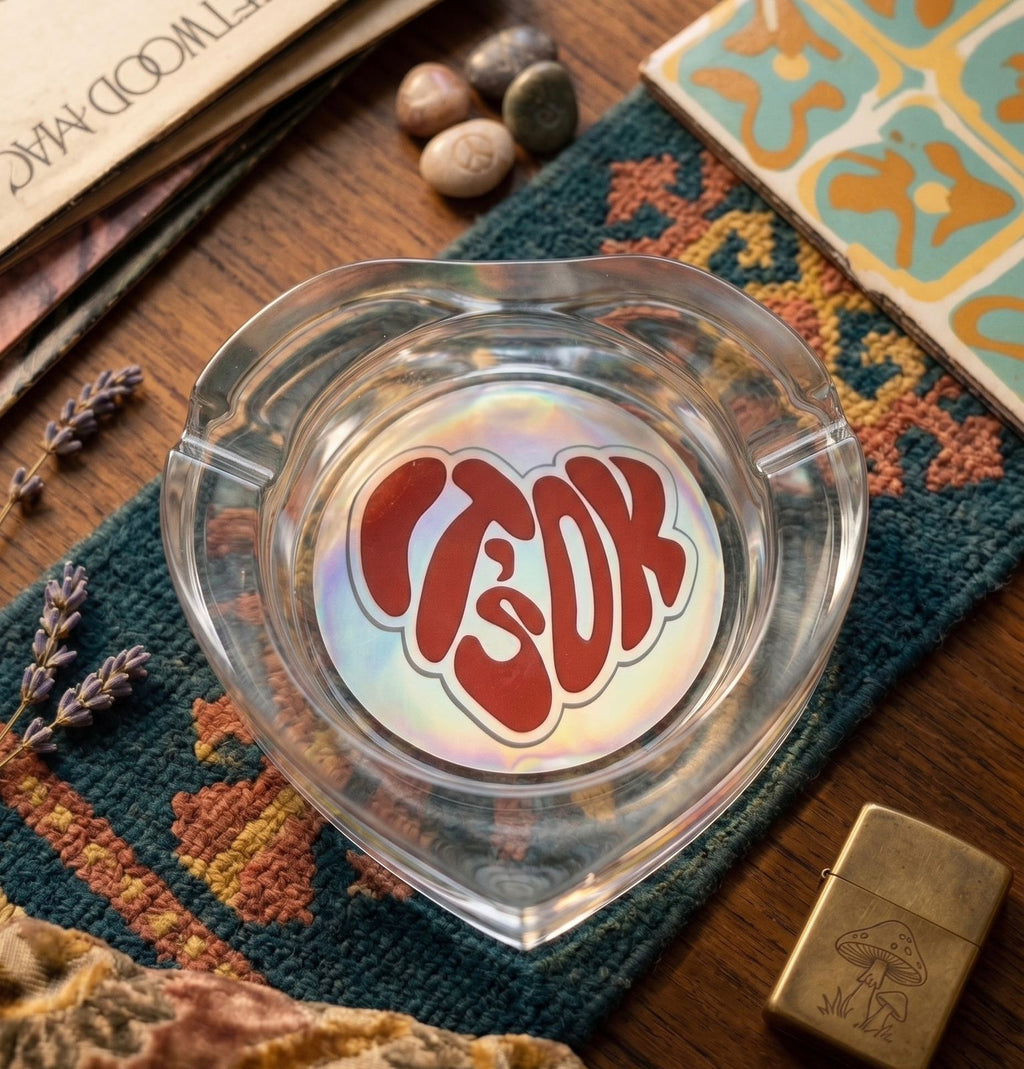 THE "IT'S OK" HEART-SHAPED GLASS ASHTRAY